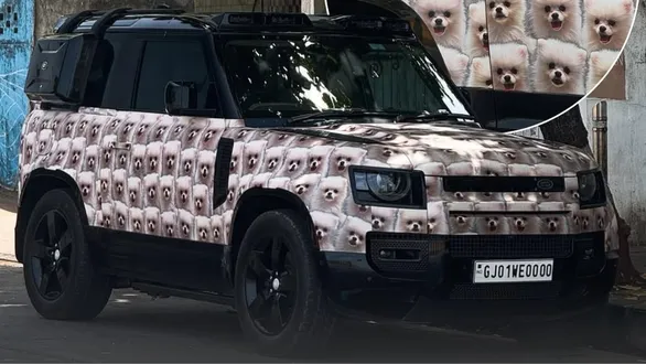 owner-wraps-land-rover-defender-worth-rs-2-crore-with-beloved-dogs-pic-in-gujarat
