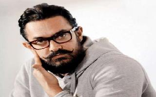 aamir-khan-shares-first-poster-of-laal-singh-chaddha-looks-as-innocent-as-tom-hanks-see-pic