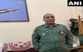 dressed-in-g-suit-rajnath-singh-to-fly-in-made-in-india-tejas-today-in-pics