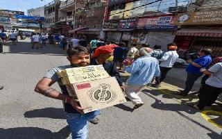 Social distancing norms go for a toss as liquor shops open after 42 days, outlets shut in 4 Delhi districts