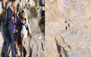 newlywed-couple-celebrates-wedding-by-skydiving-off-a-cliff-with-guests-watch