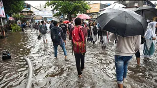 Weather Updates: Heavy Rains Disrupt Daily Operations In Mumbai, Assam; IMD Predicts Showers In Karnataka, Delhi NCR, Other States