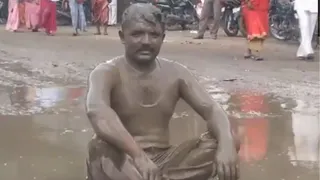 CPI Leader Takes Mud-Bath In Unique Style Protest As Maharashtra Faces Waterlogging Issues | Watch Video