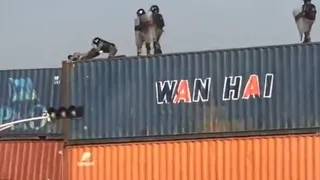 pakistan-protest-security-forces-push-praying-protestor-off-25feettall-container-video-goes-viral