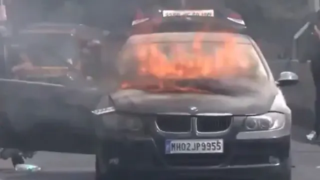 mumbai-traffic-disruption-bmw-catches-fire-on-jogeshwari-bridge-video-goes-viral