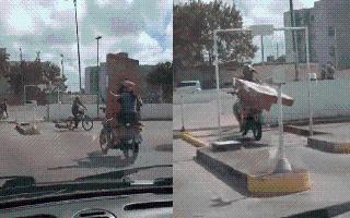 viral-video-duo-carrying-new-tv-set-on-bike-leaves-internet-questions-logic-here-what-happened-next
