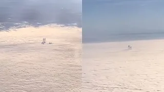 Aliens Spotted In Clouds? Video Of Mysterious Human-Like Figures Seen From Airplane Goes Viral