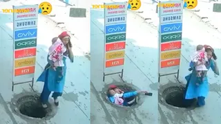 Woman Holding Baby Falls Into Open Manhole; Viral Video Sparks Outrage Over Safety Concerns