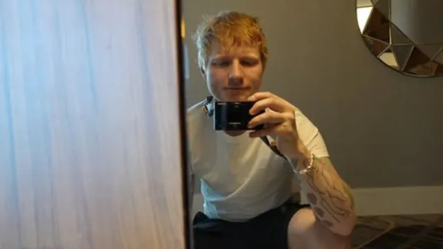 bengaluru-police-stops-ed-sheeran-surprise-sidewalk-performance-of-shape-of-you-watch
