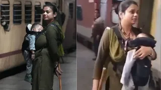 RPSF Constable Carries Baby While Ensuring Passenger Safety At New Delhi Railway Station; Netizens Praise Her