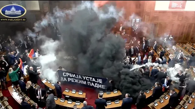 serbian-opposition-leaders-throw-smoke-grenades-in-parliament-video-several-injured-know-why