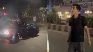 vadodara-accident-accused-taken-to-crash-site-for-recreation-seen-limping-and-holding-ears-watch