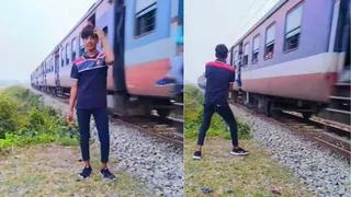 Boy Filming Reel Near Speeding Train Gets Kicked By Passing Passenger, Internet Has No Sympathy