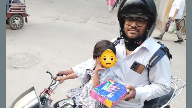 swiggy-delivery-agent-rides-with-2-year-old-daughter-to-complete-orders-viral-post-melts-hearts-online