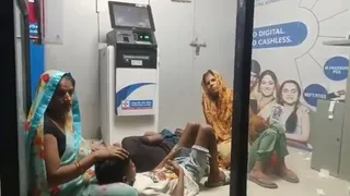 Massive Power Cuts In UP Force Jhansi People To Take Shelter In ATM; Video Goes Viral