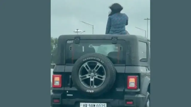 woman-films-reel-sitting-on-top-of-speeding-thar-on-delhi-jaipur-expressway-case-registered-viral-video