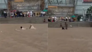 Mumbai Kids Enjoy Swimming In Waterlogged Streets Outside Mall, Netizens Call It ‘Too Much’ | Viral Video