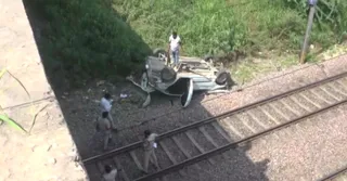 Delhi: Speeding Car Loses Control, Falls Off Mukarba Chowk Flyover To Land On Tracks Near Haiderpur Metro | Video