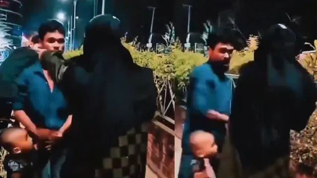 muslim-couple-slap-each-other-with-slipper-on-busy-street-while-baby-watches-helplessly-video-goes-viral