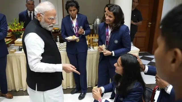 indian-womens-cricket-team-prime-minister-narendra-modi-serving-food-to-pratika-rawal-viral-video-ind-win-maiden-womens-world-cup-cricket-updates