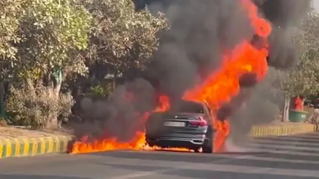 noida-bmw-bursts-into-flames-on-greater-noida-expressway-driver-escapes-unhurt-by-jumping