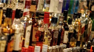 gurugram-excise-raid-47000-bottles-seized-near-signature-tower-inspector-suspended-for-multicrore-duty-evasion