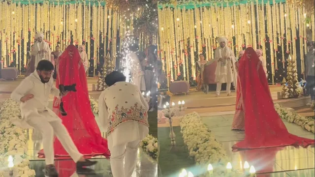 wedding-photographer-slips-behind-bride-while-capturing-grand-entrance-viral-video-has-everyone-laughing