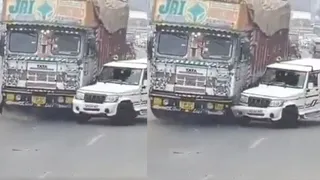 Horrific Accident Caught On CCTV: Mahindra Bolero SUV Crushed Under Overloaded Truck; Who’s At Fault?