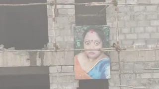 Karnataka Viral Poster: Who Is The Saree-Clad Woman Seen Hanging At Construction Sites Across State?