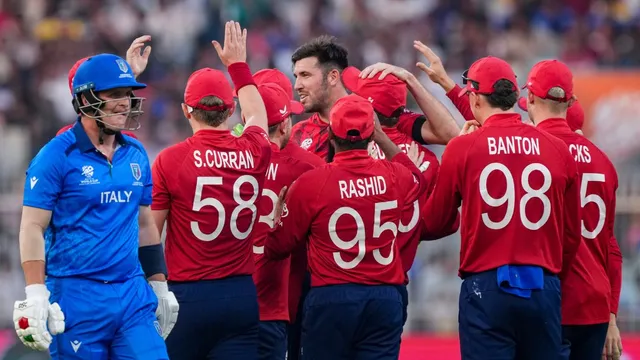 t20-world-cup-england-fend-off-italys-fightback-to-clinch-24run-win-in-kolkata-qualify-for-super-8