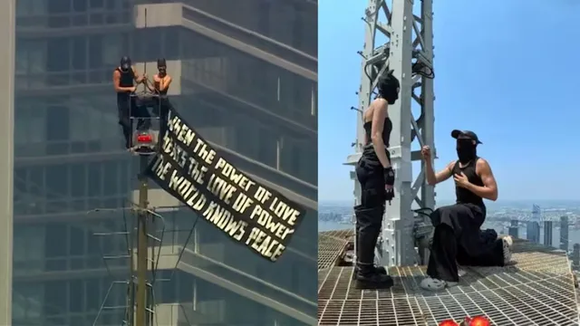 daredevil-couple-scales-empire-state-building-antenna-for-marriage-proposal-faces-arrest