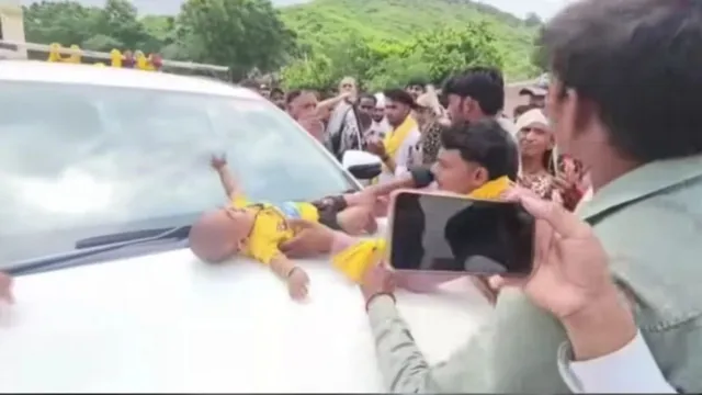 madhya-pradesh-man-puts-child-on-bjp-mla-car-bonnet-after-he-refuses-to-hear-grievances-saying-you-are-not-my-voters