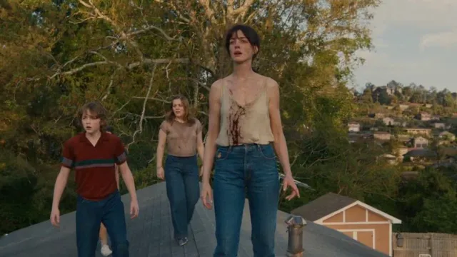 the-end-of-oak-street-hindi-trailer-out-anne-hathaway-and-her-family-battles-dinosaurs-in-scifi-survival-thriller