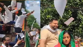 bankipur-bypolls-bjps-pamphlets-thrown-at-tejashwi-yadav-as-bjp-and-rjds-convoys-cross-paths-during-roadshows-watch