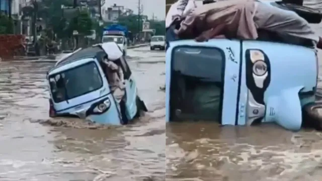 ghaziabad-rain-autorickshaw-overturns-on-waterlogged-road-locals-rescue-trapped-passengers-watch