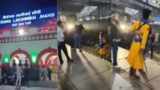 nihang-sikh-jumps-in-front-of-duronto-express-train-with-sword-in-hand-at-jhansi-railway-station-video