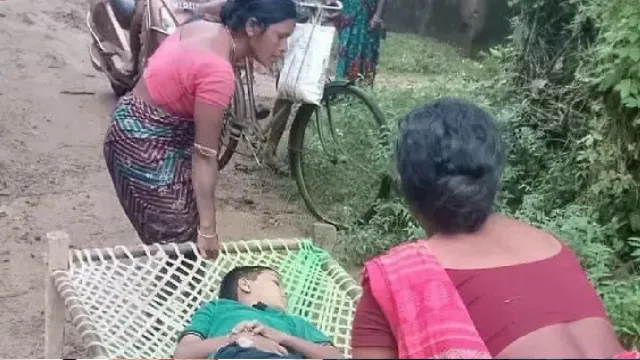 no-road-for-ambulance-odisha-woman-carries-son-on-cot-for-1-km-13yearold-dies