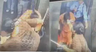 Ghaziabad: Dog In Lift Triggers Clash After Woman Pulls Teacher's Hair, Slaps And Hits Her With Stick | VIDEO