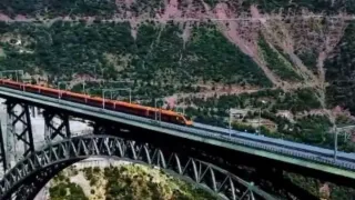 vande-bharat-sets-new-record-crosses-worlds-highest-chenab-bridge-at-100-kmph-kashmir-katra-srinagar-vande-bharat-express