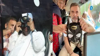 batmans-cameo-in-march-to-supreme-court-against-cec-as-rahul-gandhi-kharge-seen-with-mask-of-superhero-video